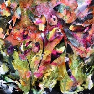 A painting of leaves in different colors