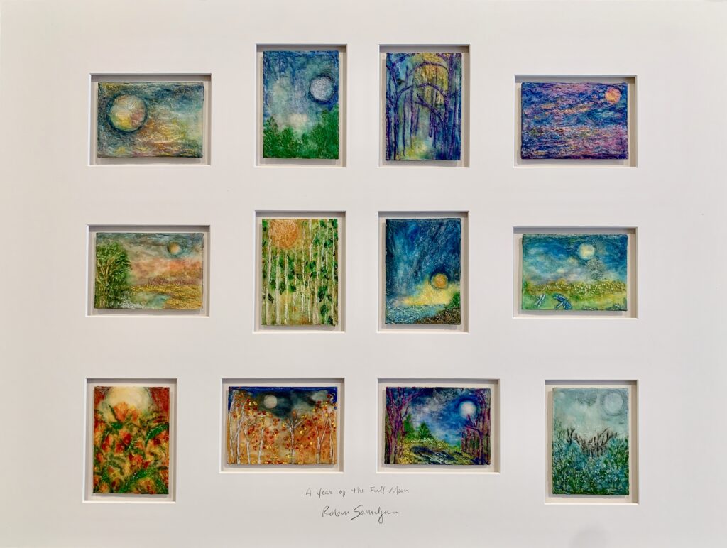 Twelve colorful abstract landscape paintings in frame.