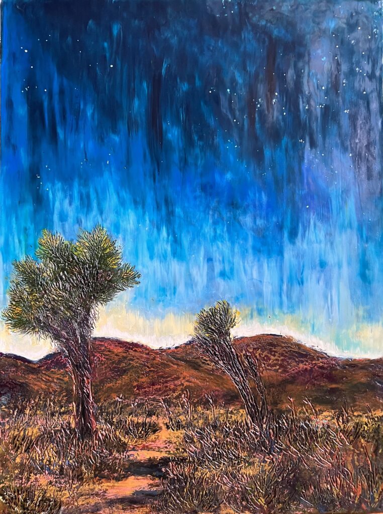 Starry desert landscape with two trees.