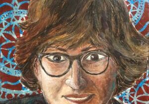 Portrait of person with glasses, colorful background.