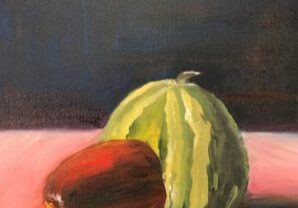 Watermelon and papaya on a table.