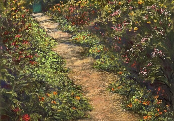 Garden path with archway and blooming flowers.